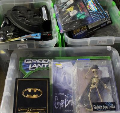 A large quantity of sci-fi related boxed and unboxed figures and craft to include Star Wars, Playmates Classic Star Trek Classic Phaser, Star Trek figures, various items related to Batman to include small Batmobile, a boxed Green Lantern figure and toy gun etc (3).