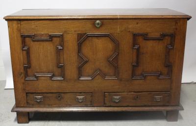 A 19th century panelled oak mule chest with two base drawers, width 136cm.