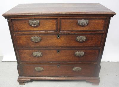 A Georgian oak straight front chest of two short over three long drawers, raised on bracket feet, width 103cm.