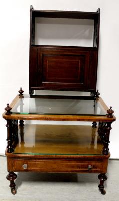 An Edwardian inlaid mahogany wall-hanging cabinet, 55 x 41cm and a small two-tier table/trolley with carved and inlaid detail on casters (2).