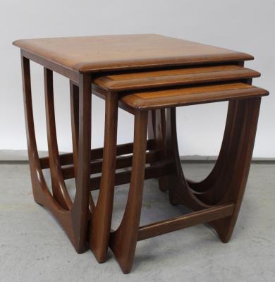 A G-Plan nest of three teak coffee tables.