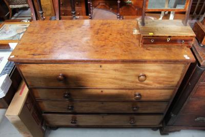 A Victorian mahogany chest of drawers with deep top drawer above three shallow drawers, raised on bun feet, width 123cm.