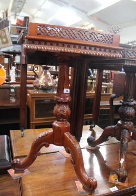 A reproduction occasional table, with carved gallery edges, height  72cm.